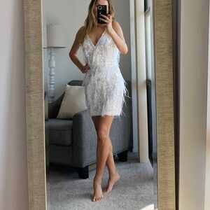 “Banjul" white sequin, feather mini sleeveless cocktail dress